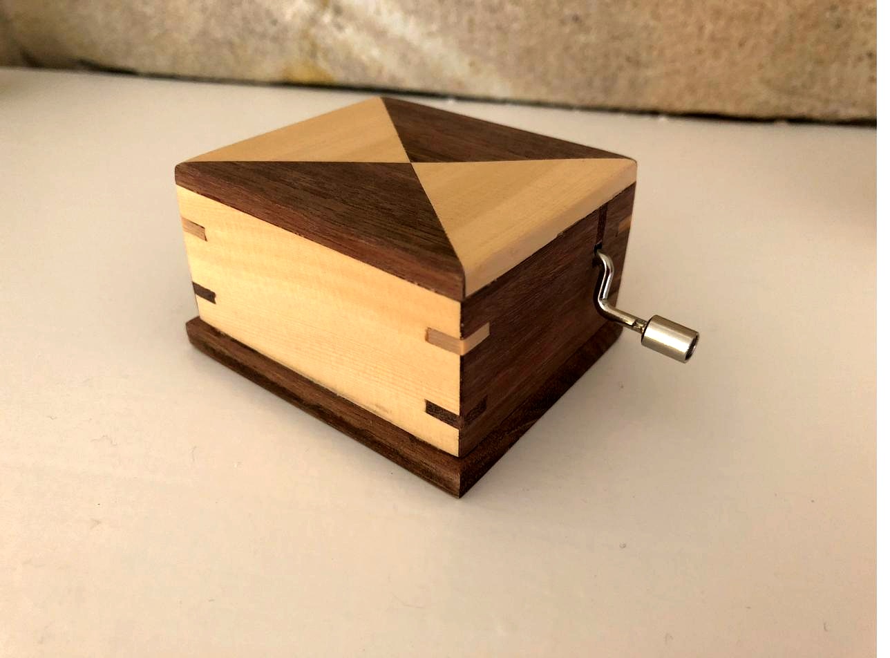 Music box in jarrah and Huon pine with finger joints and hand crank